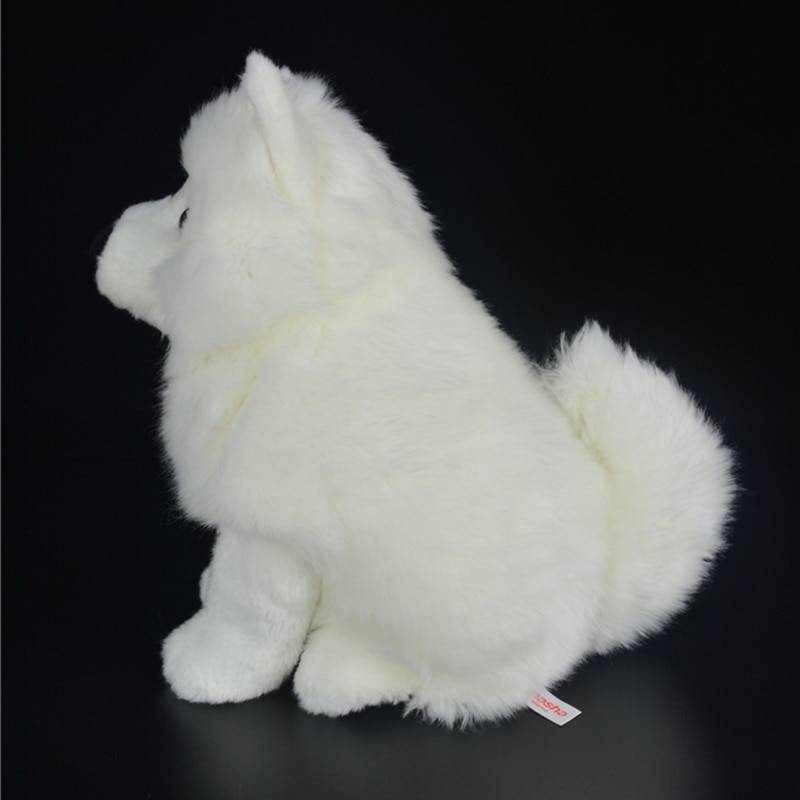 white stuffed animal dog